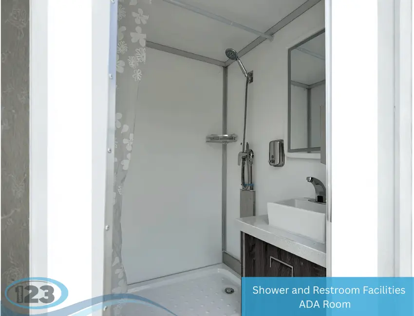 A compact bathroom featuring a shower and toilet, showcasing efficient use of space in a small room.
